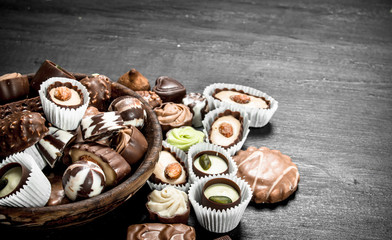 Chocolate candies in a bowl. .