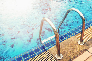 sunshine on swimming pool © Win Nondakowit