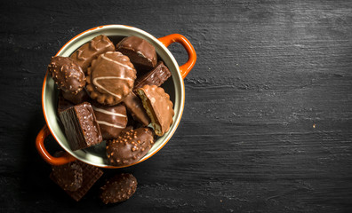 Chocolate candies in a bowl. .