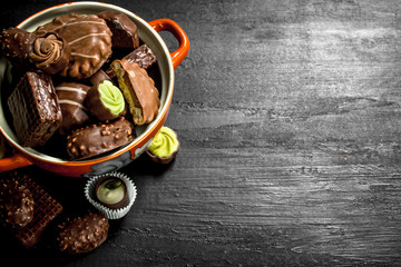 Chocolate candies in a bowl. .