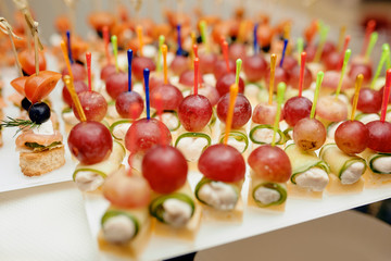 Many canape in a white plate