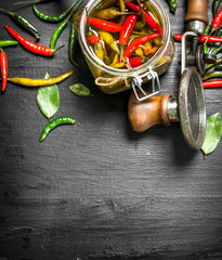 arinated hot chili peppers with seamer.