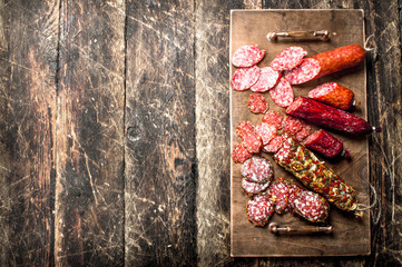 Different kinds of salami on the boards.