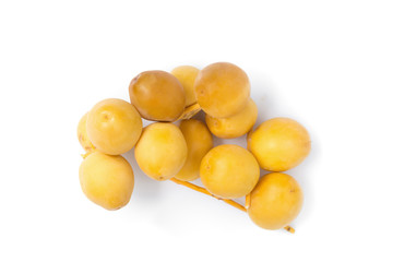 yellow raw dates isolated on white background
