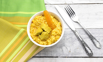 homemade arabic food basmati rice with chicken and carrot in white glass bowl