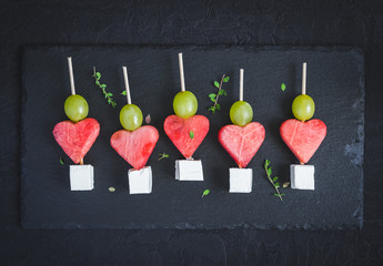 Snack for Valentine's Day. Watermelon, feta and grapes on skewers