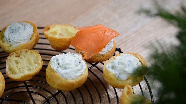 Profiteroles with salmon and cream cheese