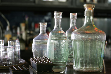 vintage bottles on the counter bar