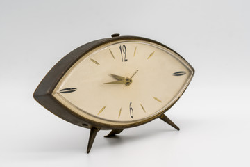 Vintage watch, alarm clock isolated on white background