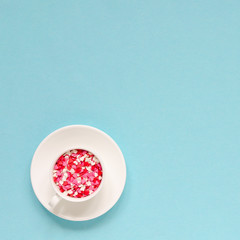 Coffee cup with colorful hearts