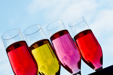 yellow and red drink with  sky background