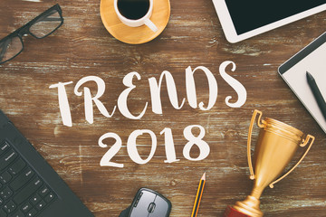 2018 trends concept with technology business items, view from above.