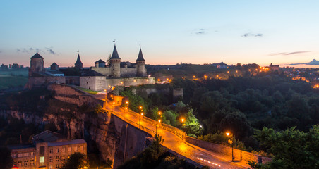 View on the castle in Kamianets-Podilskyi in the evening. Ukraine