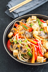 Stir fry with noodles, tofu and vegetables