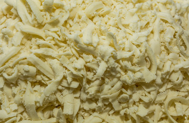 cheese cut for pizza preparation .Close -up