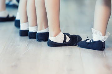 Close Up Of Feet In Children's Ballet Dancing Class