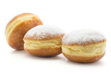 Three traditional doughnut (Sufganiyah) isolated on white background fresh baked with powered sugar without hole.