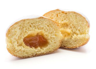 One doughnut (Sufganiyah) cut in half with apricot jam isolated on white background fresh baked two halves with powered sugar.