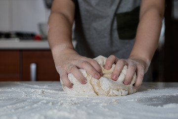 Tasty dumplings with potato filling. Making dumplings in the kitchen.