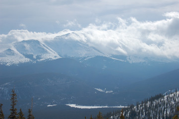winter cloud landscape with mountain trees snow breckenridge colorado usa