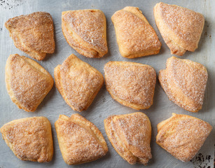 Home made cookies on baking pan. Top view.