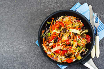 Vegetables with ginger in frying pan