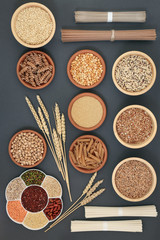 Dried macrobiotic super food with japanese soba and udon noodles, legumes, seeds, grains, whole wheat pasta, seeds and nuts. Foods high in protein, omega 3, anthocyanins and antioxidants.