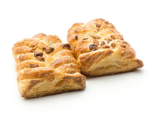 Twist breads pair isolated on white background with pecan nut and jam inside.
