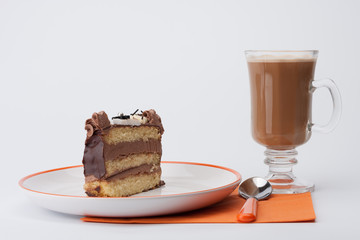 Piece of sponge cake with chocolate cream