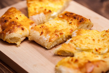 khachapuri (ghvezeli) in a half moon form for christmas day, Georgia