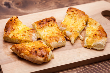 khachapuri (ghvezeli) in a half moon form for christmas day, Georgia