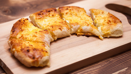khachapuri (ghvezeli) in a half moon form for christmas day, Georgia