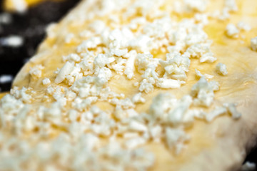 dough with cheese for cooking traditional Georgian dish khachapuri (ghvezeli), Christmas