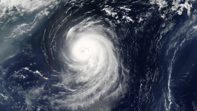 hurricane spinning in ocean from satellite from above. eye of a large typhoon. hurricane in the ocean. hurricane storm, tornado, satellite view