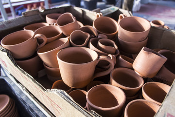 Perspective shot for batch of traditional turkish coffee handmade cup design from clay in the box