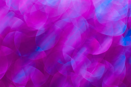 Purple and Pink Abstract Background with Bright Bokeh Lights