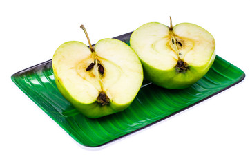 Halves of a fresh green sliced apple