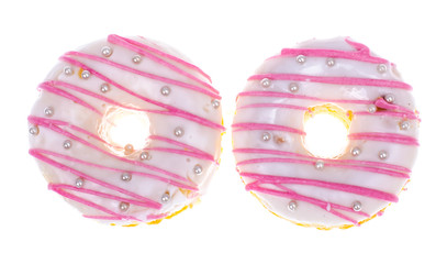 Delicious donut with white pink glaze on light background