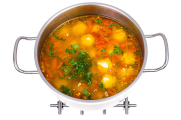 Pan with vegetable soup and meat balls