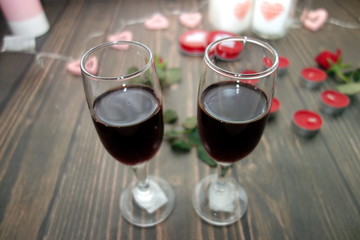 Two glasses of wine on vintage background