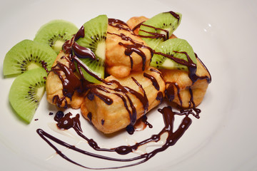 deep fried banana with chocolate and kiwi