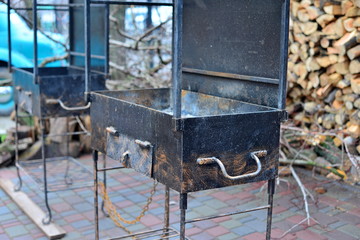 Firewood for the barbecue near the little cafe