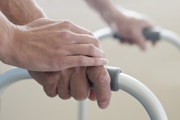 Patient using walking frame