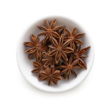Star anise in white bowl