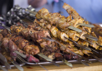 Fried shish kebab on skewers.