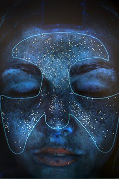 Image of young woman's face in skin clinic