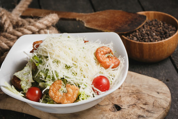 Shrimp Caesar salad with Parmesan cheese