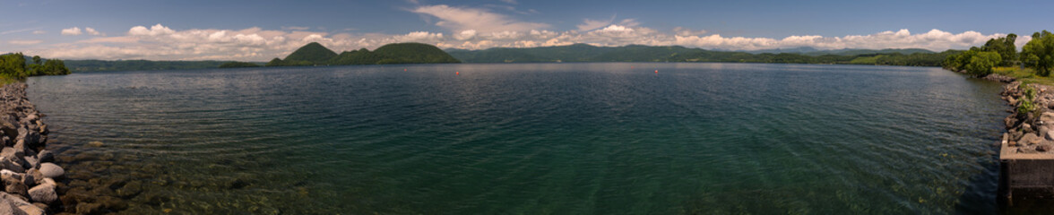 Fototapeta premium Panoramic views on beautiful clear mountain lakes of Shikotsu-Toya National Park, Hokkaido, Japan