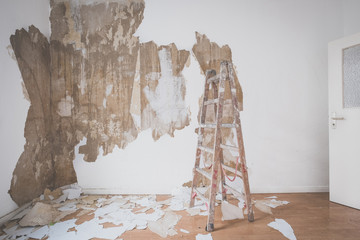 ladder in empty room during renovation