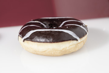 A close up shot of a choco donut